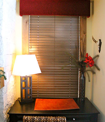 Soft valances  and cornice boards, red shades and wood