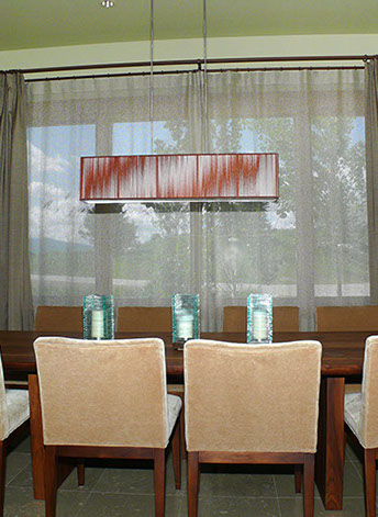 sandy drapes, seat cushions, striped, tan trending pillows and fabrics. vignettes close up view, bright pillows