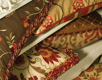sandy drapes, seat cushions, striped, tan trending pillows and fabrics. vignettes close up view, bright pillows