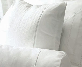 sabine soft furnishings white chir, drapes and pillows front and back 